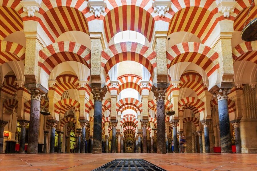 Mosque-Cathedral of Córdoba Guided Tour with Tickets - Cathedral additions: chapels, stained glass, carved wood, and plasterwork