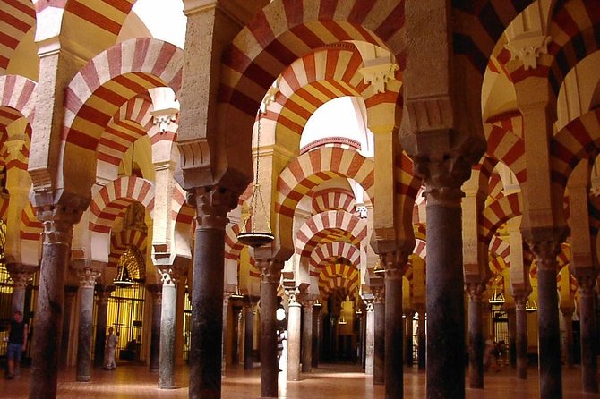 Private Tour of Cordoba Week Days 2 Hours Tickets included - Entering the Mezquita-Catedral: arches, light, and the mihrab story